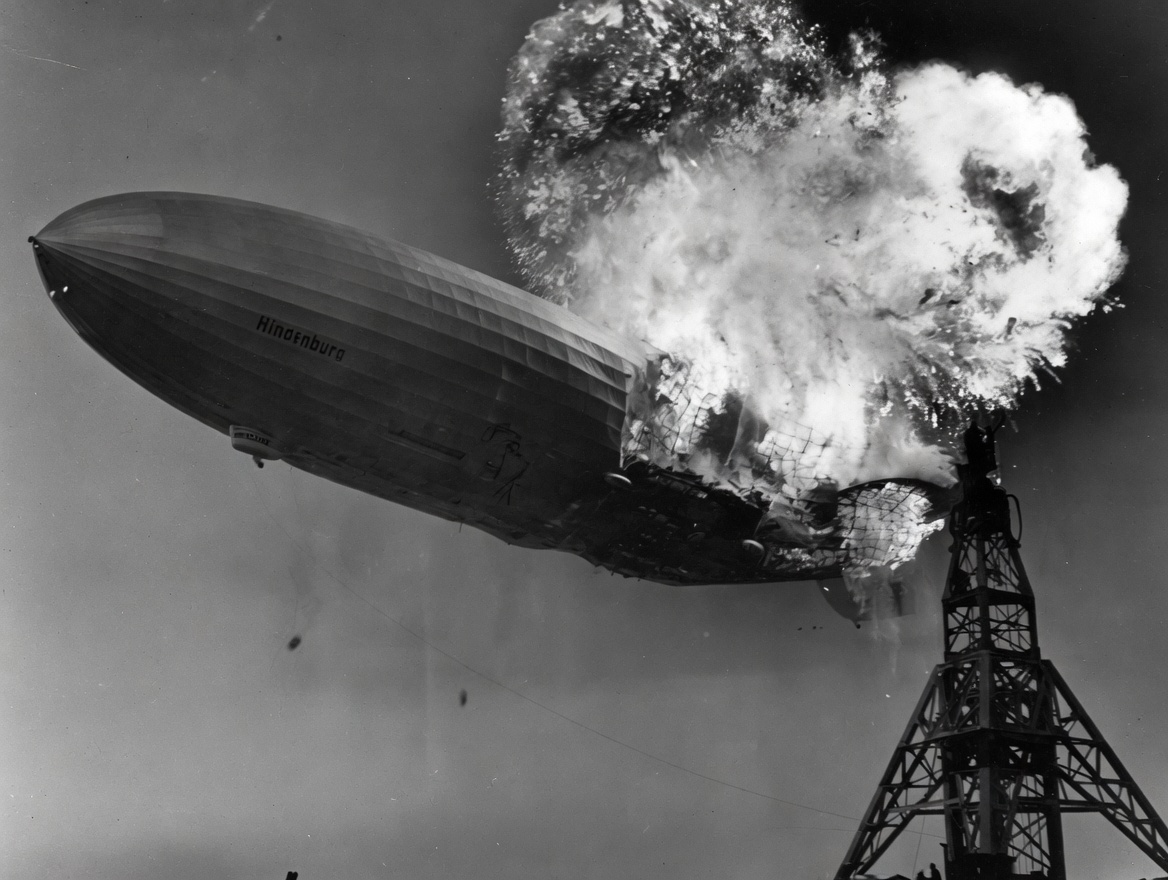 The LZ 129 Hindenburg airship in flames as it crashes at Naval Air Station Lakehurst, New Jersey on May 6, 1937 — the disaster that Franklin B. Kelly narrowly avoided by calling off work the night before.