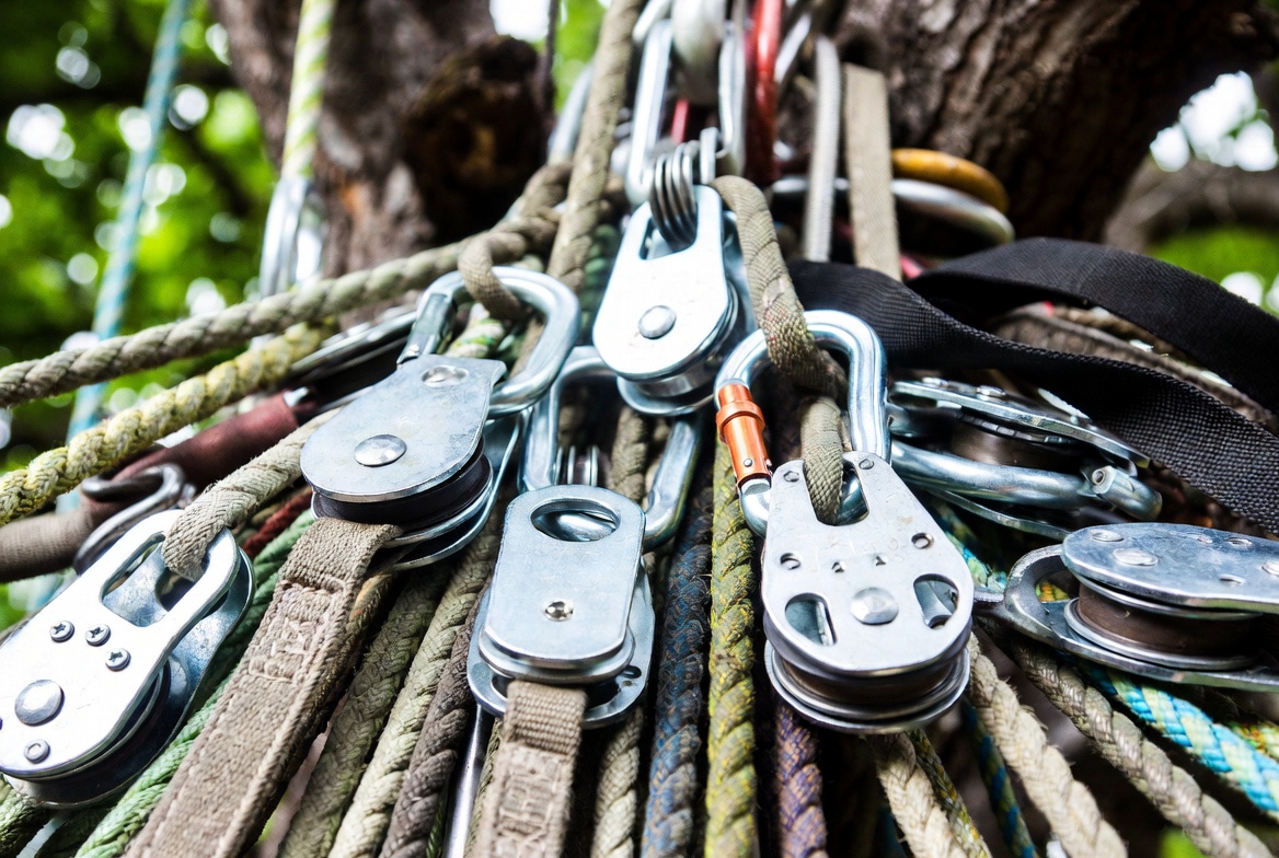 Rigging liability tree service insurance - close-up of rigging blocks, carabiners, slings, and ropes - Kelly Insurance Group